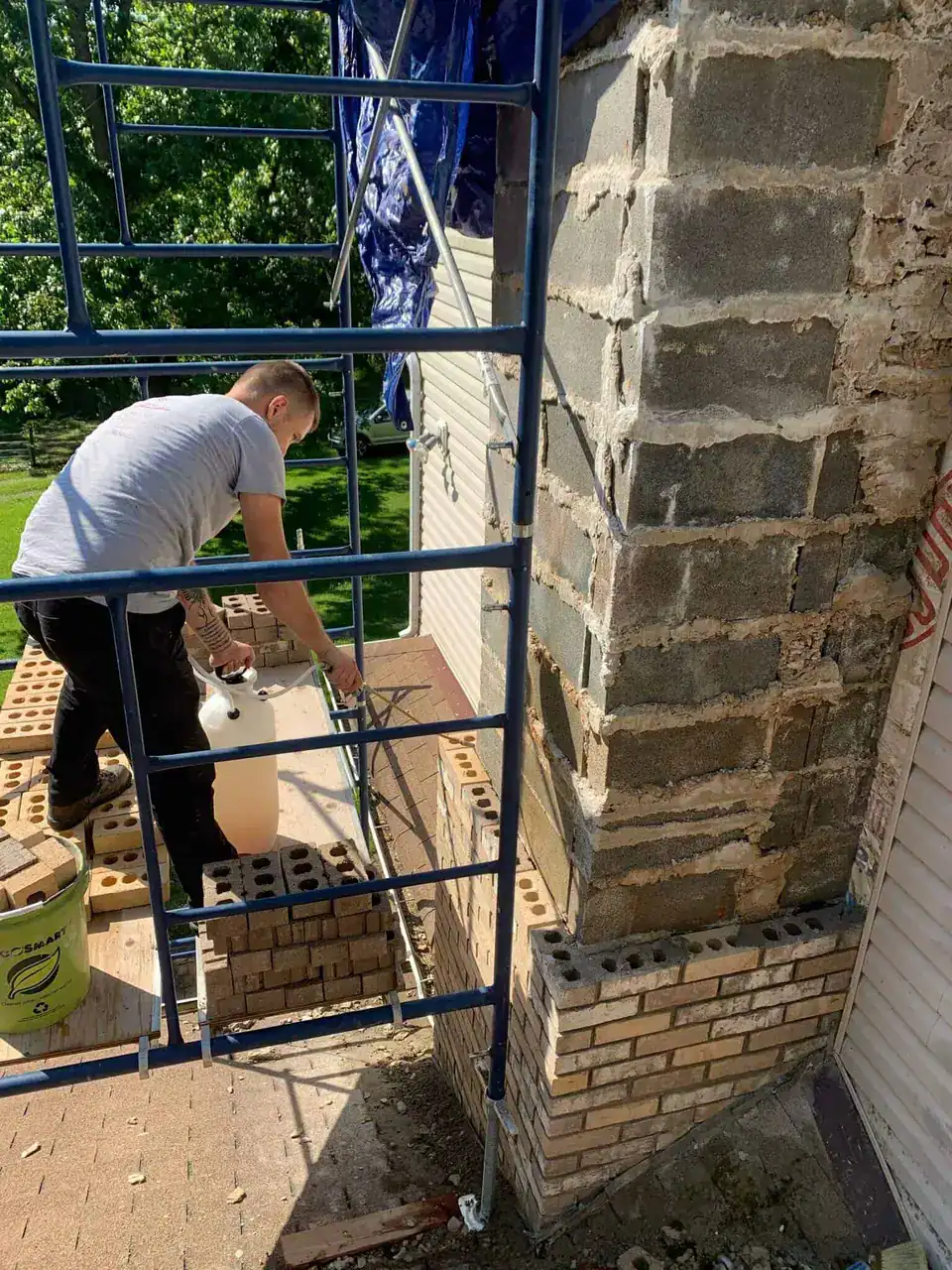 Roof repair by Boundless New Jersey Roofing Contractors on a residential chimney.
