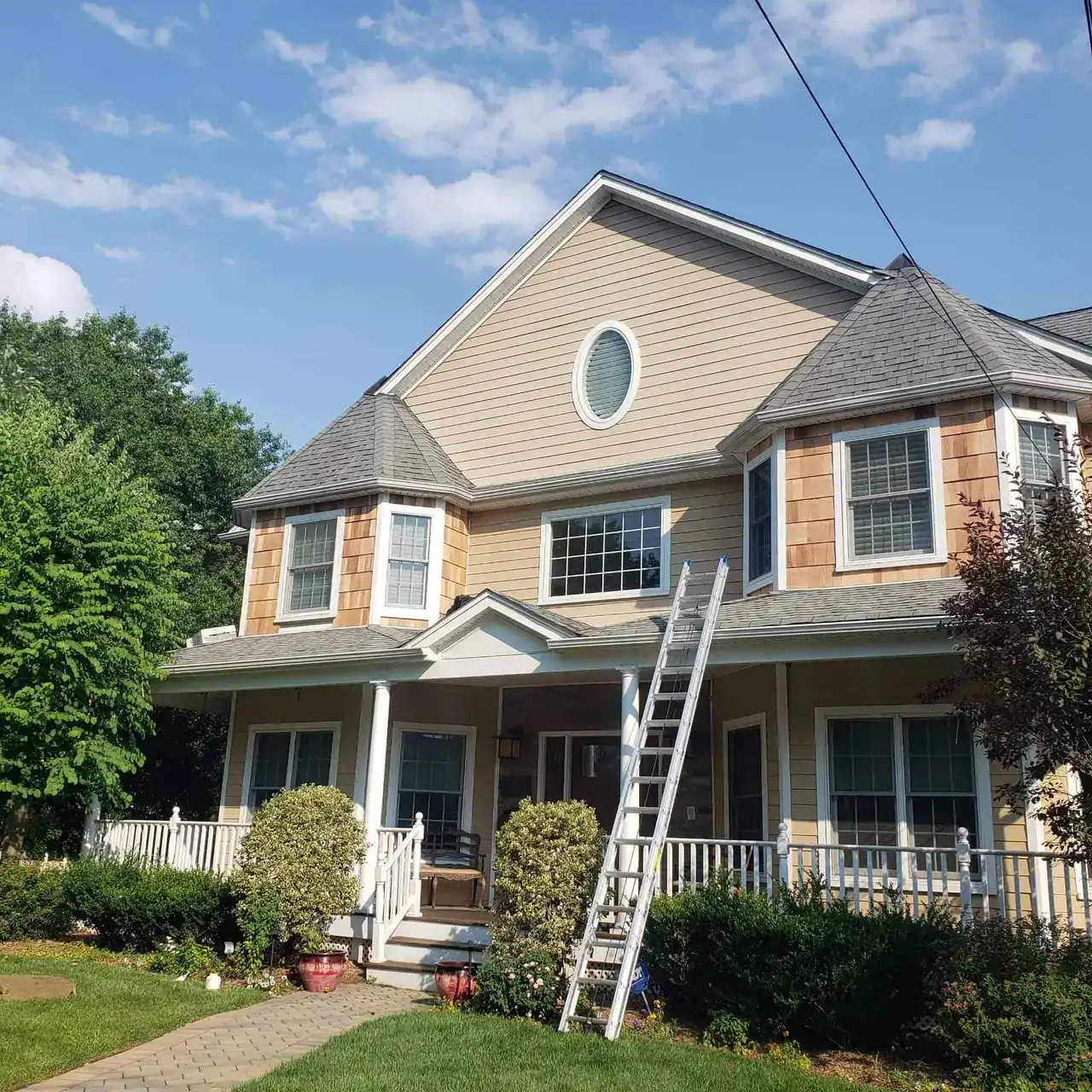 Boundless New Jersey Roofing Contractors working on house roof repair and replacement.